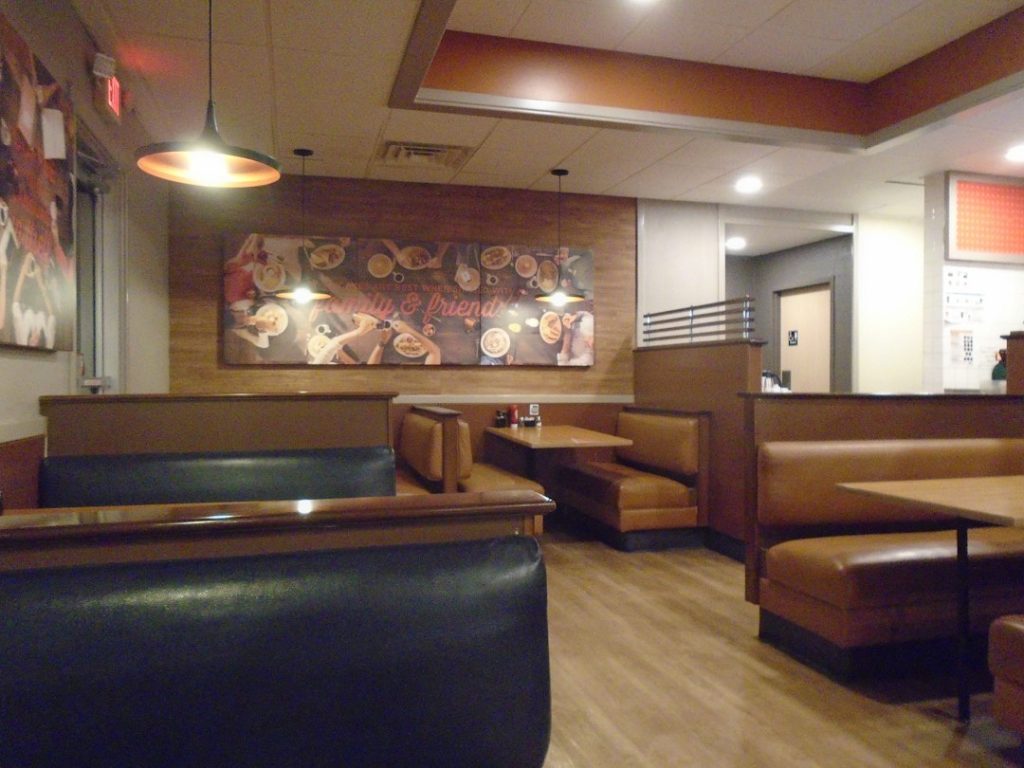 Photo weather resistant pleated shade chandelier restaurant booth
