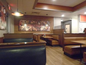 Photo weather resistant pleated shade chandelier restaurant booth